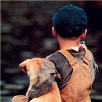 小男孩和狗的头像,人与动物之间的情真的很难得了