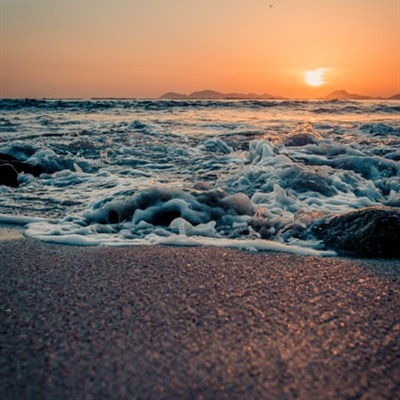 夕阳风景头像 好看夕阳下的海滩图片