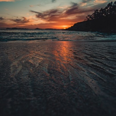 夕阳风景头像 好看夕阳下的海滩图片