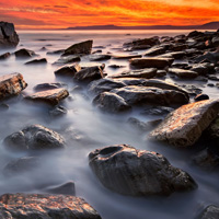 海岸岩石风光图片,夕阳是最美丽的
